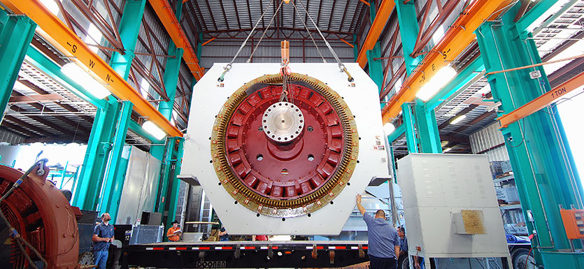 Photo of an Ultra Large Motor Being Loaded for Transport